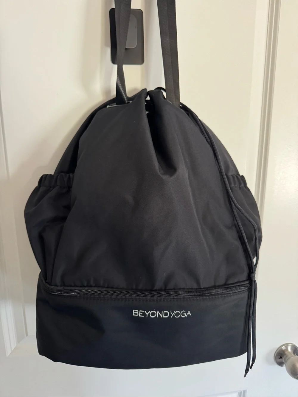 Beyond Yoga Convertible Gym bag backpack in Black. Bottom shoe compartment.